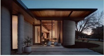 Modern robotically printed home at dusk